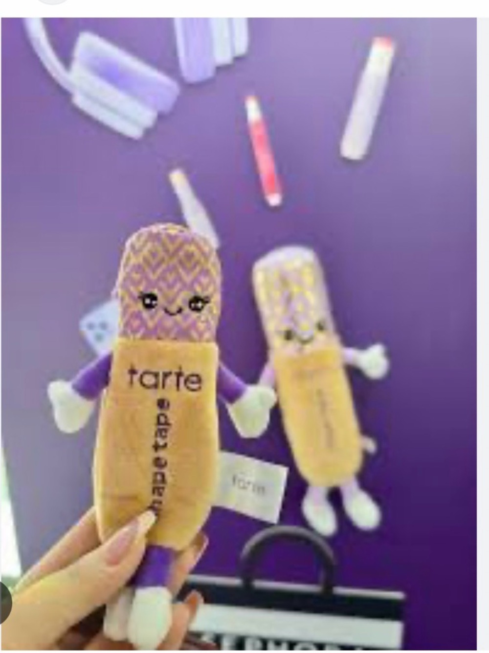 Looking for Tarte Plush Mascot Keychain in Purple, Gold & Cream